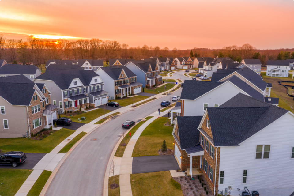 Neighborhood of houses at sunset