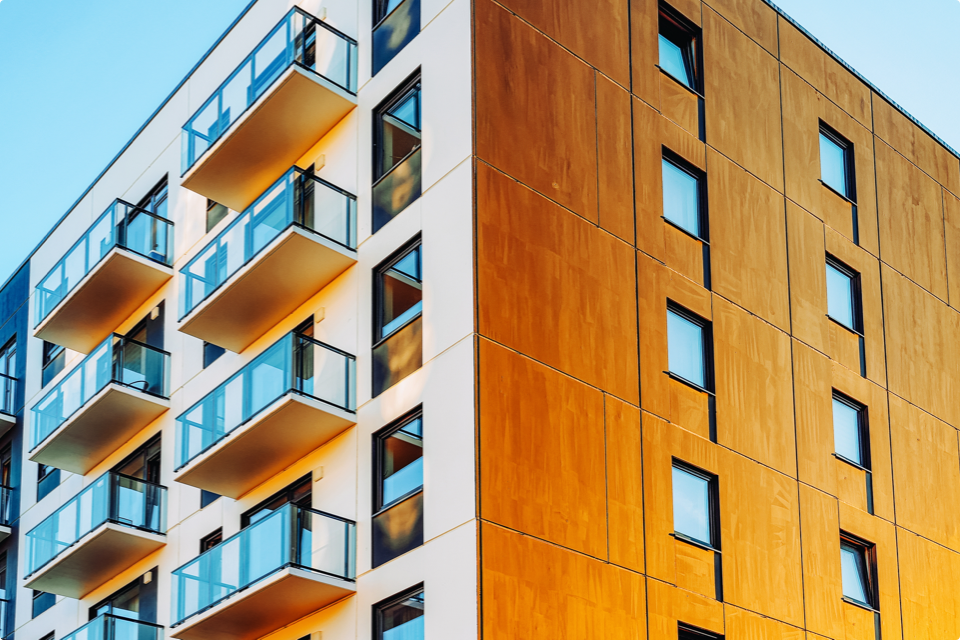 Side view of modern apartments with balconies